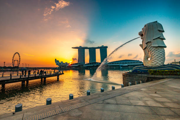 Singapore - September 14, 2019: The Merlion statue fountain and the Singapore skyline. The landmark statue is considered the personification of Singapore.